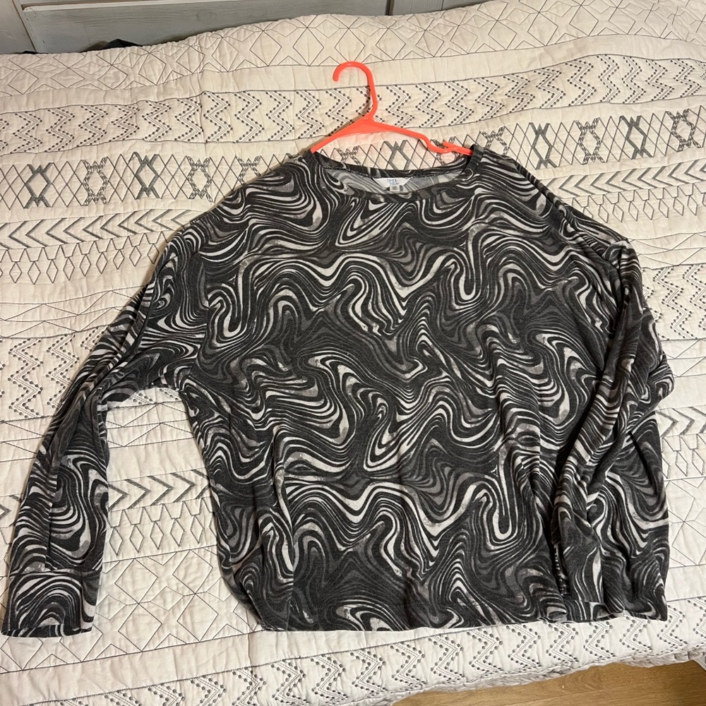 Ladies, long sleeve knit top with gray and white swirl pattern